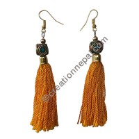 Decorated bead yellow yarn earring