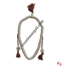 Flat white bone prayer beads